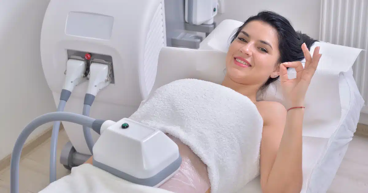 woman smiling after coolsculpting