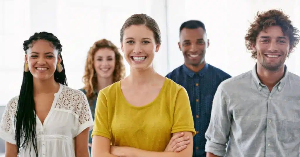 A group of people smiling